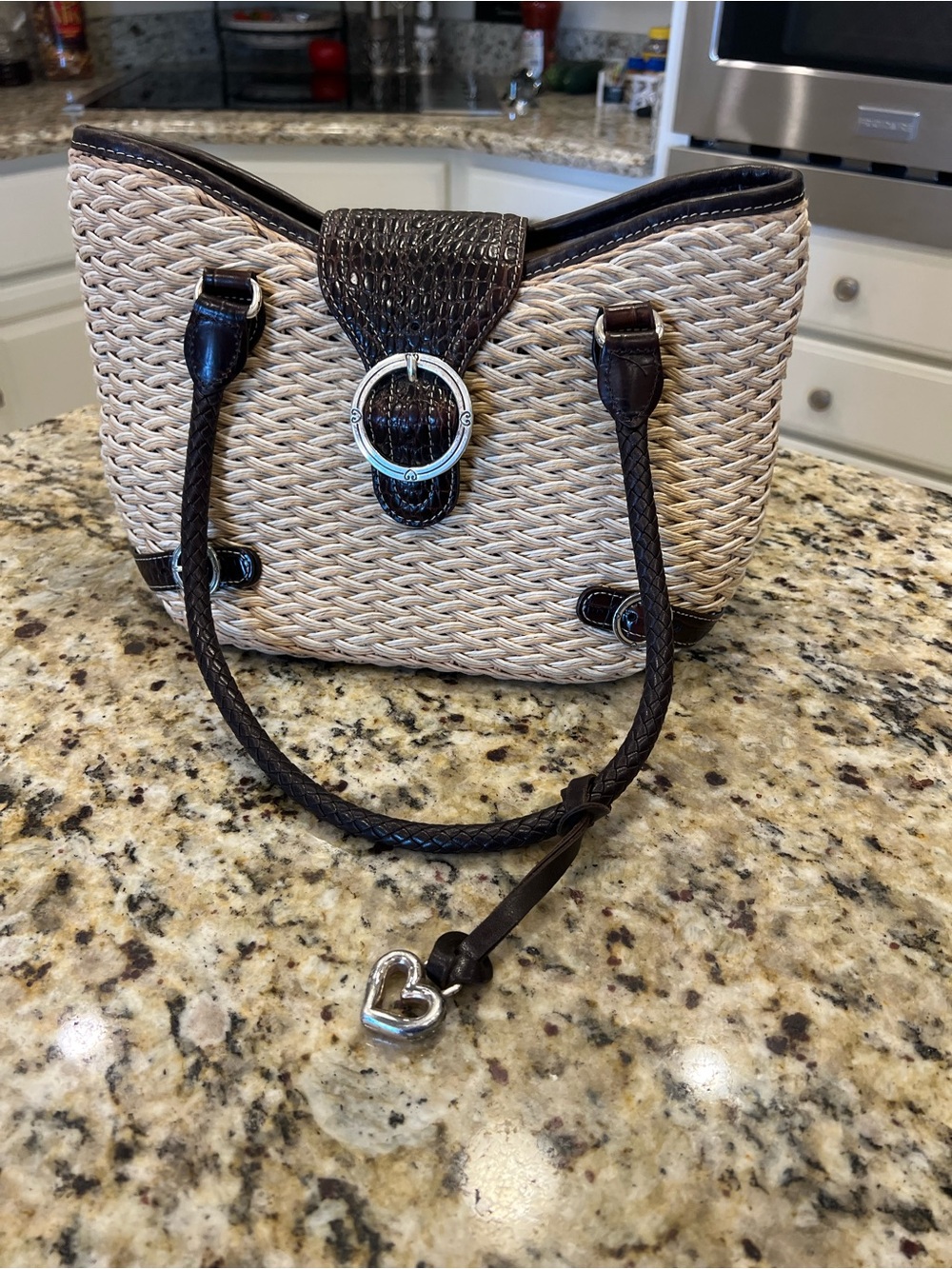 Brighton Woven Straw Shoulder Bag with Dark Brown Trim & Silver Heart Charm.
